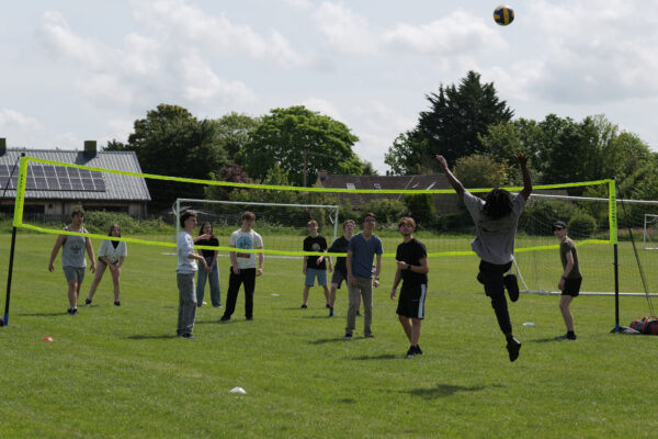 Students playing volleyball